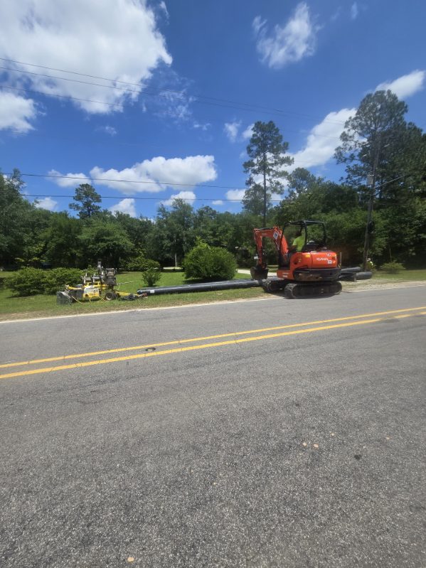 HDD boring rig performing a road crossing