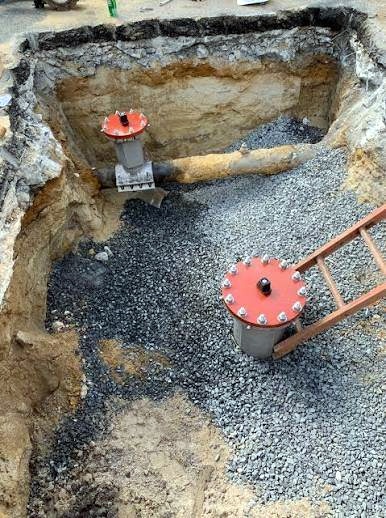 Excavated underground valve installation area